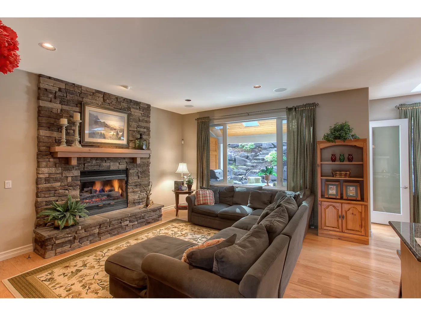 Remodel living room around a stone fireplace